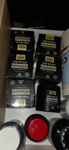 Customer's multiple boxes and one jar of XARA Pure Shilajit Gummies inside a drawer.