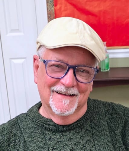 A smiling reviewer shown in a headshot, happy with their XARA SHILAJIT® Pure Shilajit Gummies.